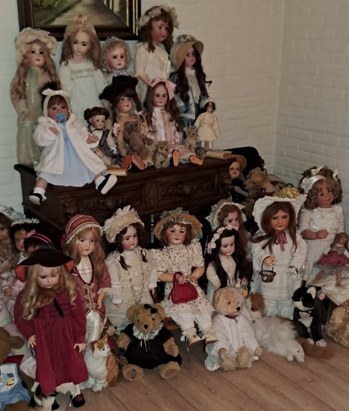 Antieke poppen te koop